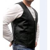 Sheepskin vest with knobs & laced